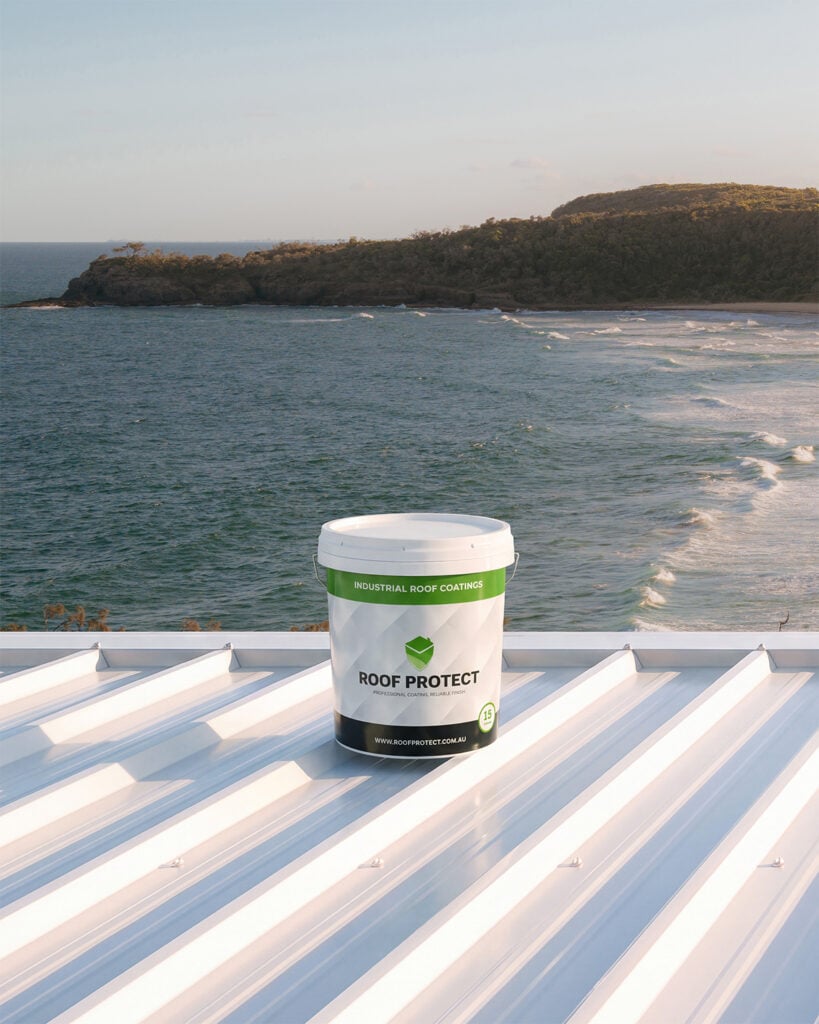 Industrial Roof Coatings Roof Protect 15-year roof paint on a white metal roof overlooking the Australian coastline.